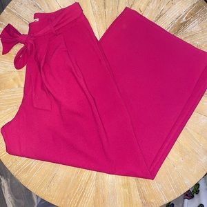 FLYING TOMATO size large. Fuchsia wide leg high rise trousers